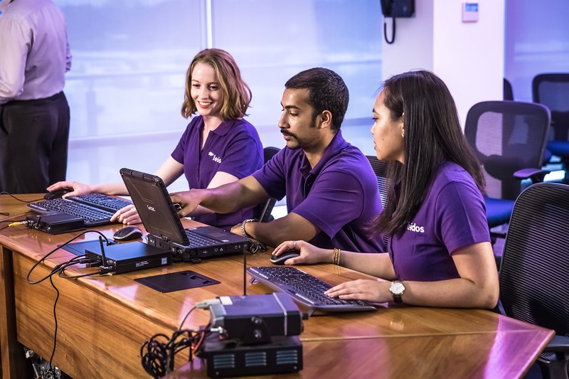 Leidos employees in training